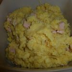 Kartoffeln untereinander mit Sauerkraut und Kasseler Rezeptfamilie